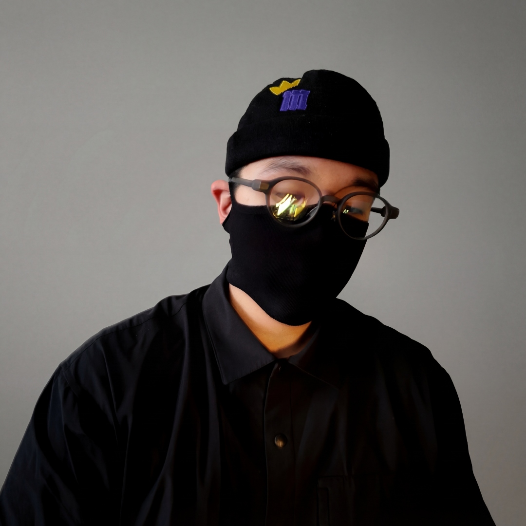 MAKETH — masked artist portrait with beanie and glasses